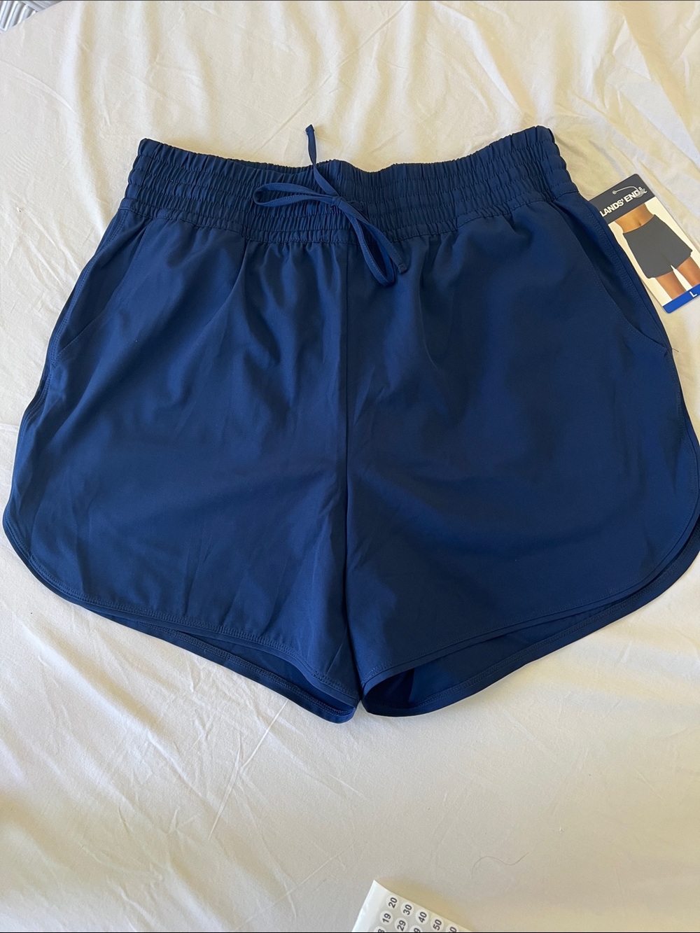 Lands' End Navy Smocked Waist Athletic Shorts or swim shorts.